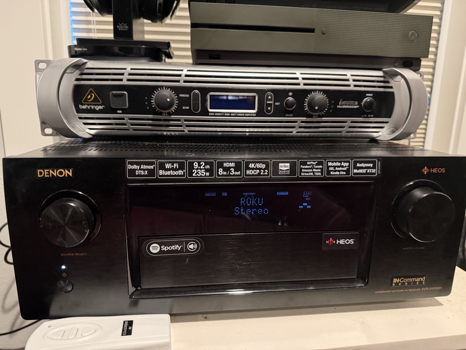 Denon 9.2-channel AV receiver with a Behringer iNuke power amplifier.